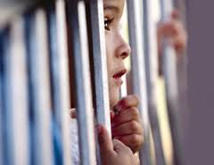kid behind bars